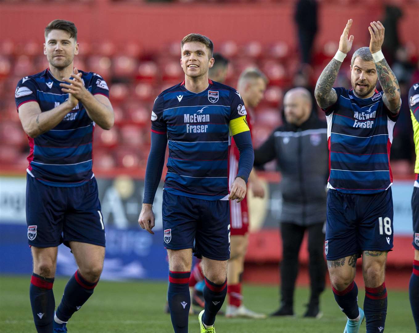 Iain Vigurs, Marcus Fraser and Richard Foster celebrate the win away at Aberdeen last Saturday. Picture: Ken Macpherson