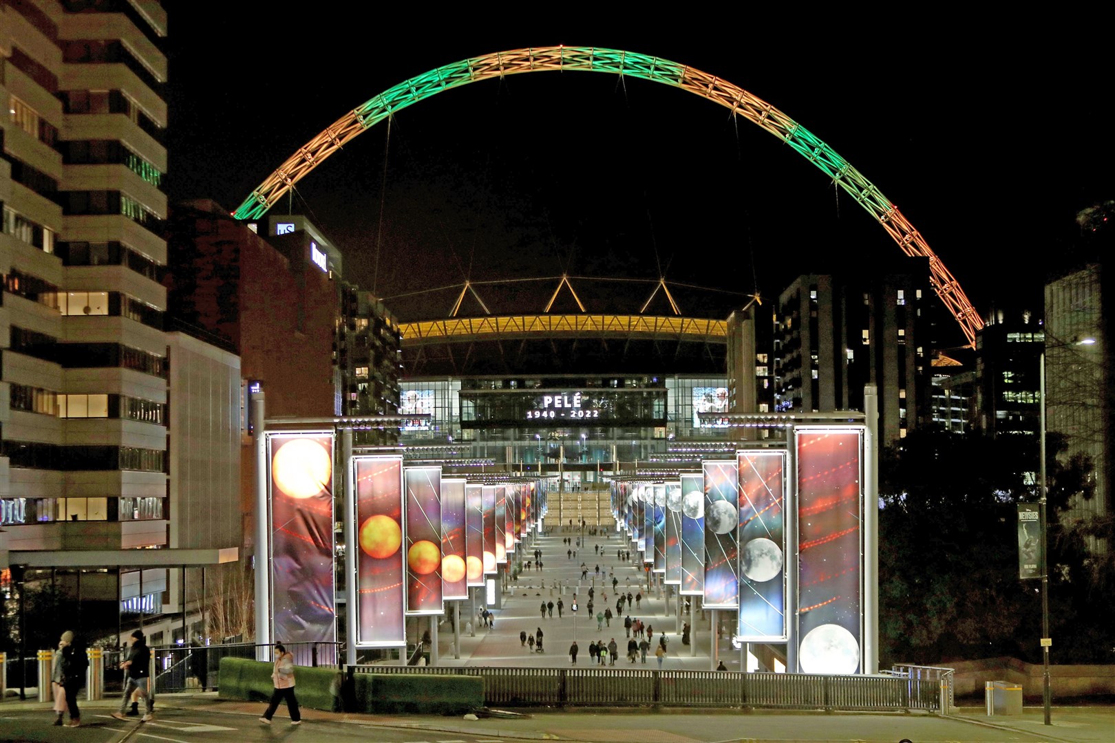 The Wembley arch is lit up in Brazil colours in memory of Pele (Kieran Cleeves/PA)