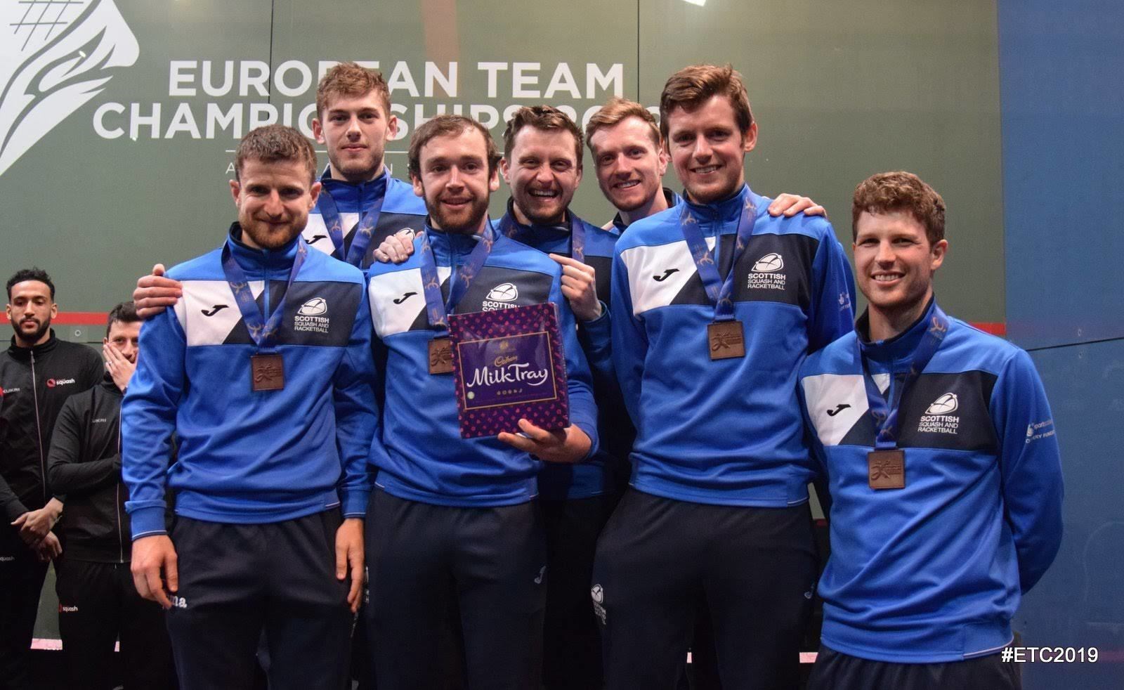 Alan Clyne (left) and Greg Lobban (second right) with the Scotland squad that won bronze at the European Championships.