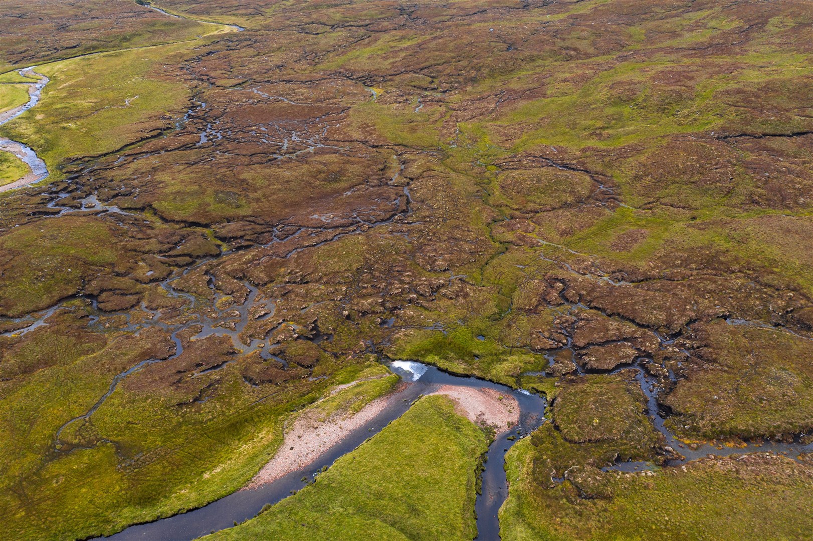 Architecture firm Halliday Fraser Munro is supporting patland restoration in Wester Ross to offset its carbon usage.