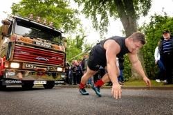 Luke Stoltman shows off his strength at a past TruckNess event in Inverness.