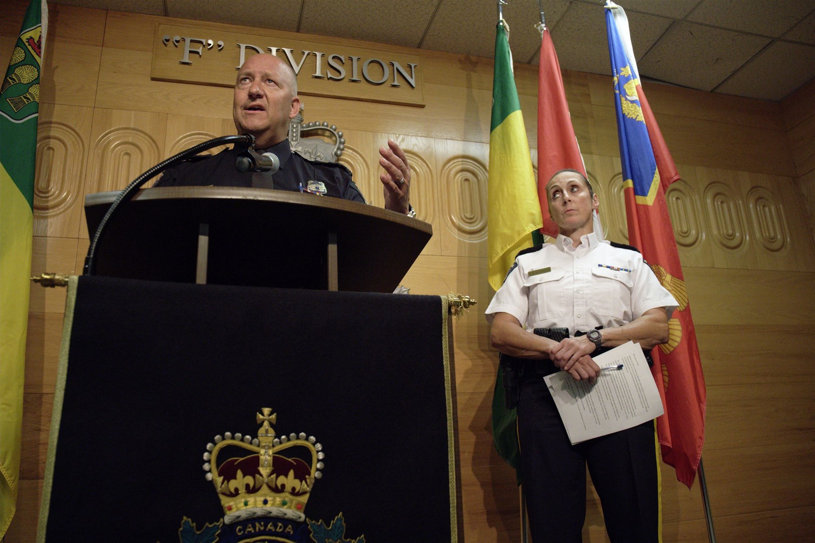 Regina Police Chief Evan Bray, left, speaks while Assistant Commissioner Rhonda Blackmore, right, looks on during a press conference at Royal Canadian Mounted Police Headquarters in Regina, Saskatchewan (Michael Bell/AP/PA)