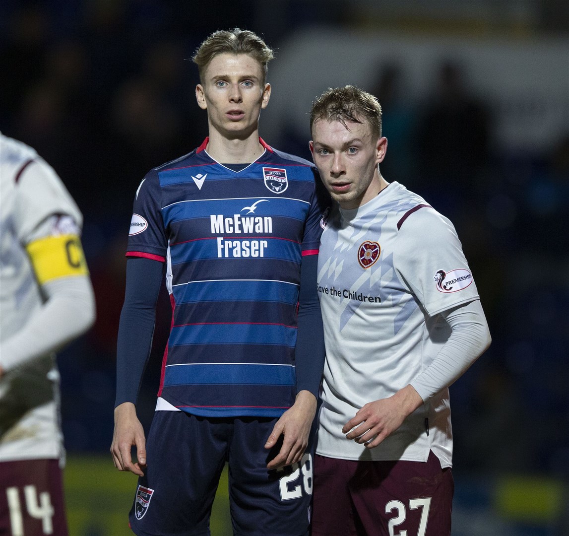 Picture - Ken Macpherson, Inverness. Ross County(0)v Hearts(0). 22.01.20. Ross County's new signing Oli Shaw is shadowed by Hearts' Lewis Moore.