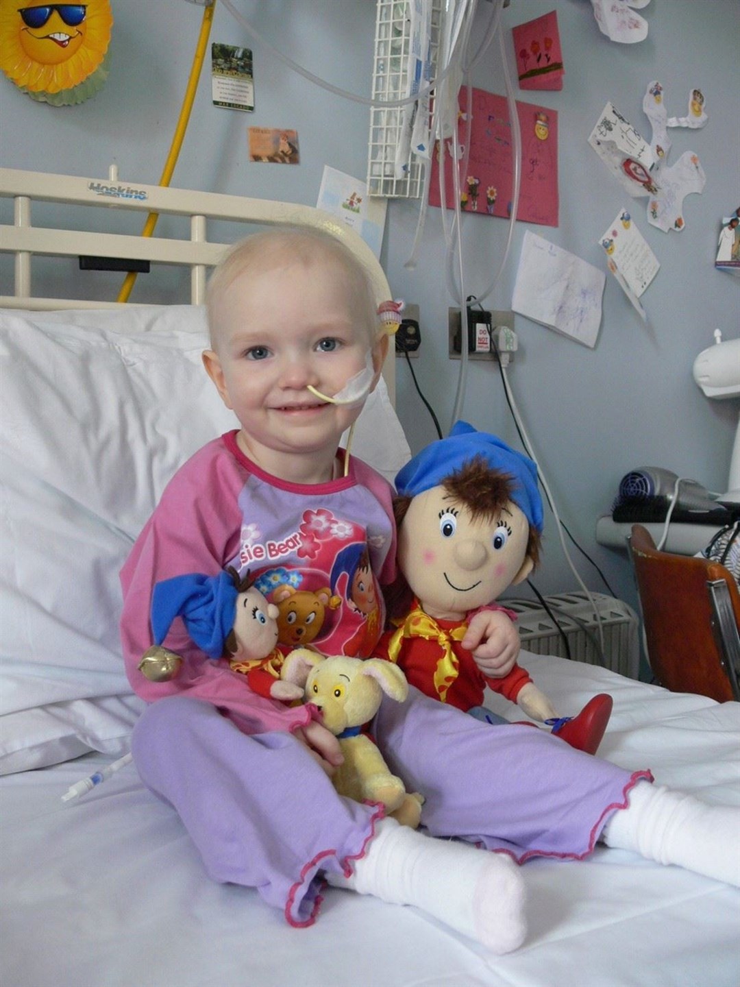 Phoebe in hospital as a young girl fighting the rare and aggressive childhood cancer neuroblastoma