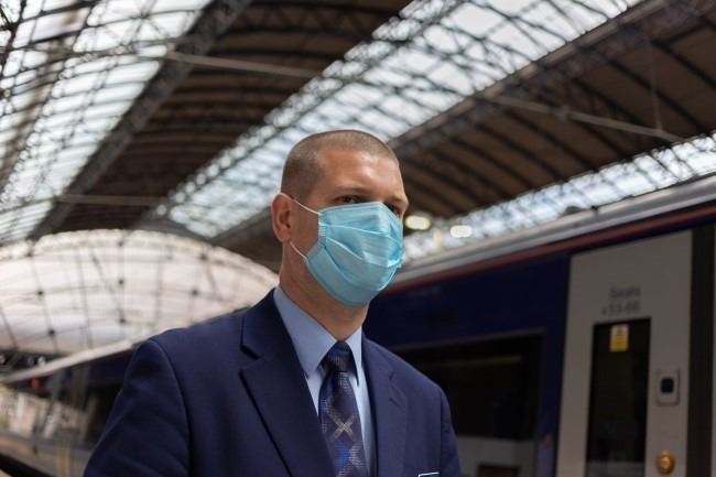 Physical distancing has been halved to one metre, but face coverings remain mandatory on trains and at stations.