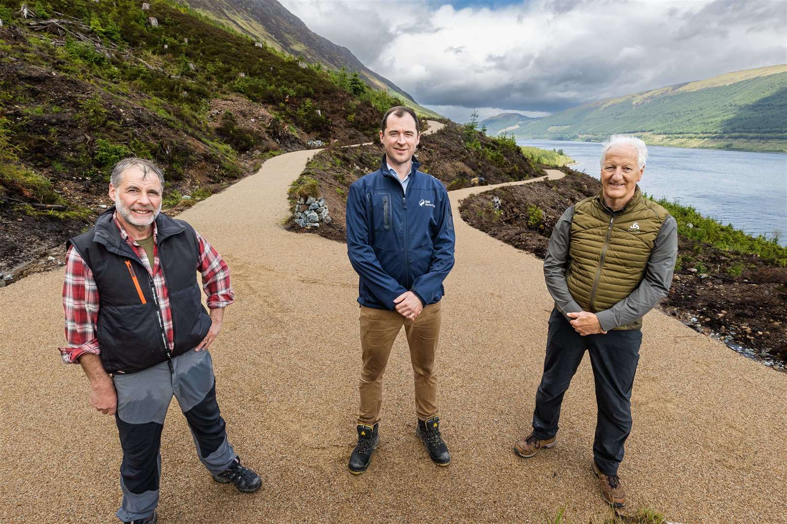 Mark Hedderwick of HiTrak Ltd, Andrew Smith of SSE Renewables and Phil Thompson of Phil Thompson Ltd on the new Great Glen Way path. Picture: SSE