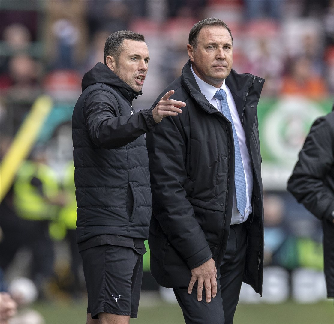 Ross County manager Malky Mackay (right), with assistant manager Don Cowie, must navigate a busy spell of matches.
