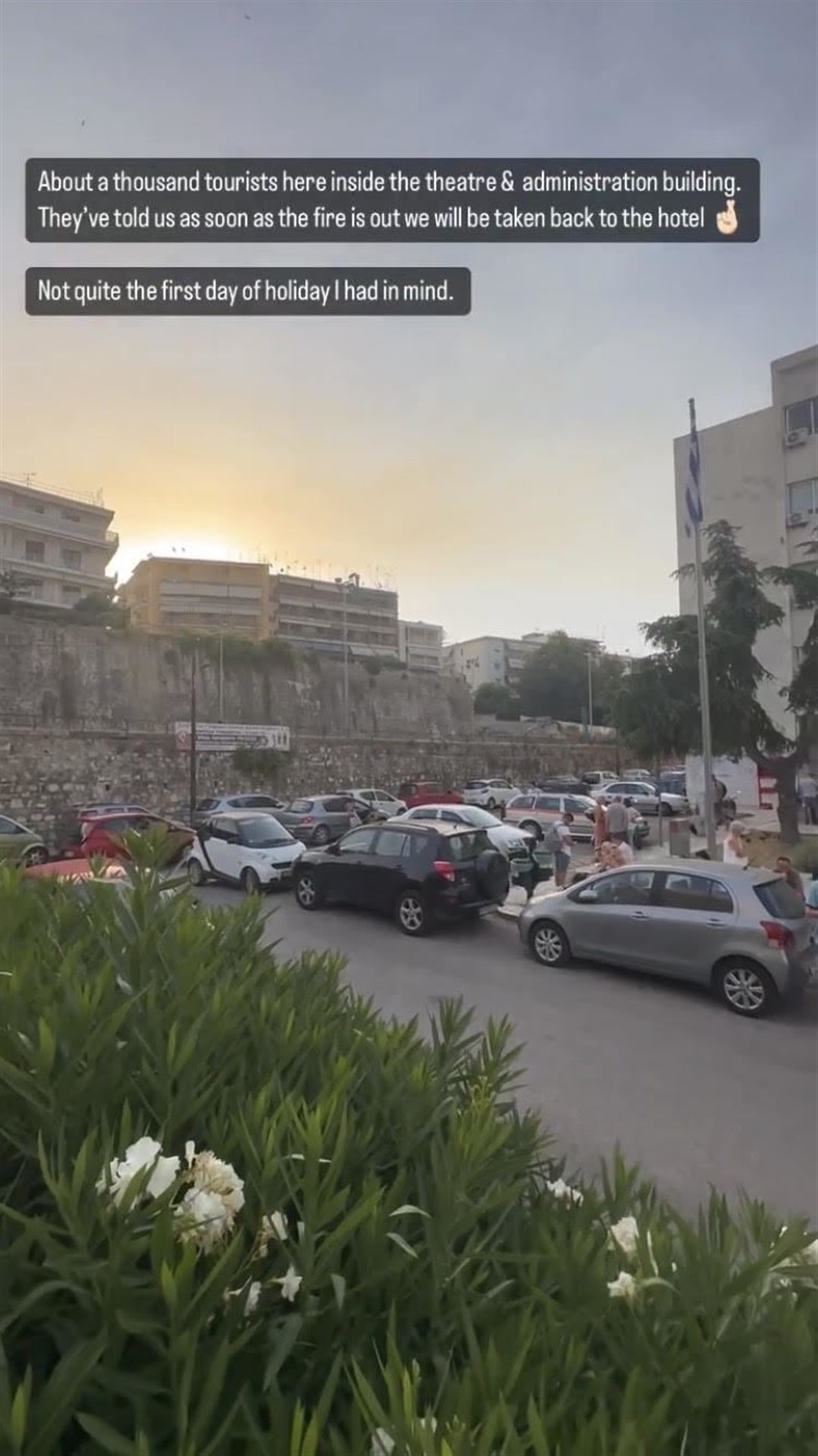 Scenes from the Corfu theatre where evacuated visitors and residents congregated. Instagram post by Adele Buyze.