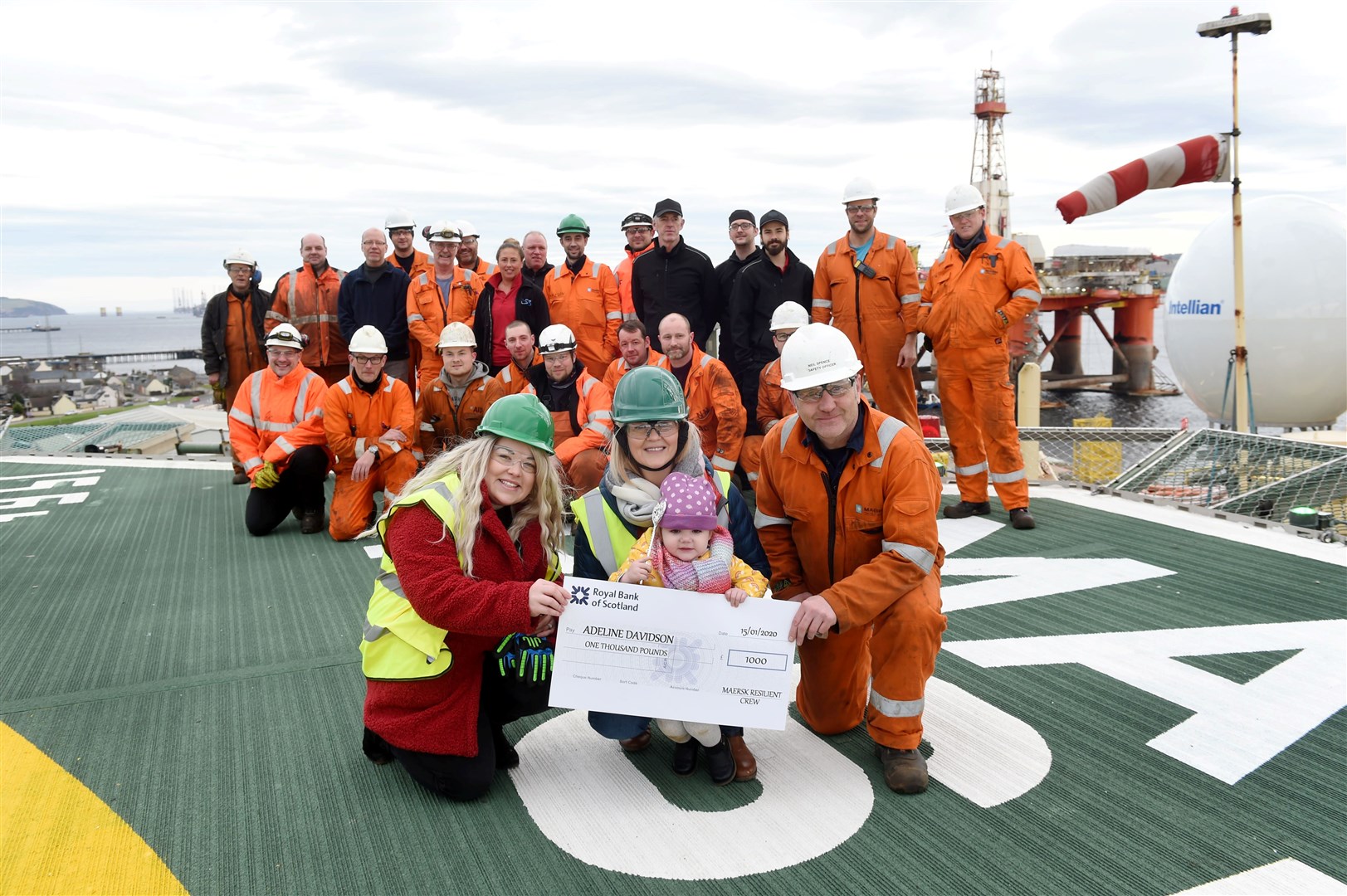 Adeline with mum Steph Davidson, granny Lorraine Davidson and Neil Spence on the helideck of the Maersk Resilient. Picture: Callum Mackay