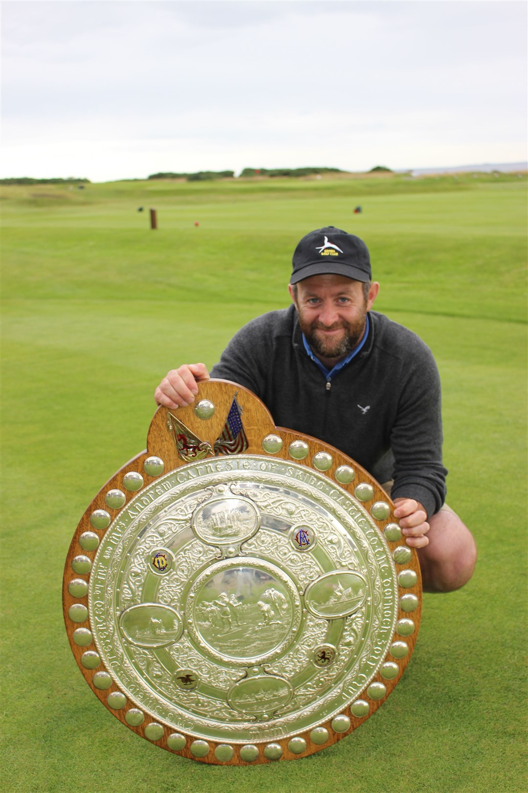 Chris Mailley with the Carnegie Shield