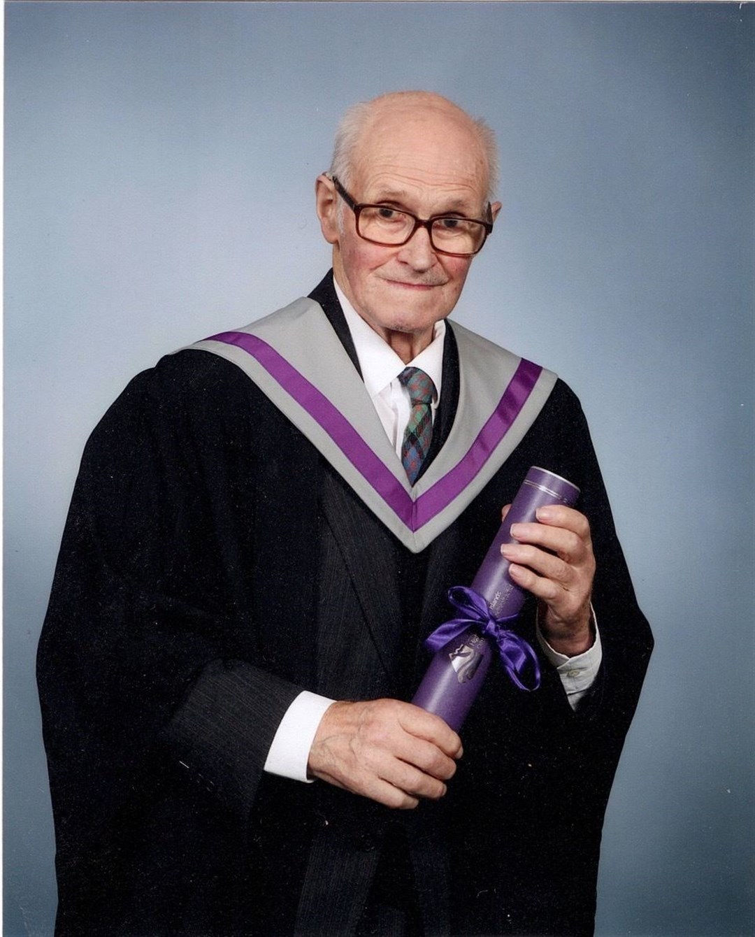 John Macdonald’s work in history, music and crofting policy was recognised when he was awarded an Honorary Fellowship from the University of the Highlands and Islands.
