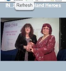 Janette Douglas, left, receives award from |Unison's Liz Mackay in 2018.