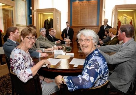 Volunteer Joan Mackenzie and visitor Sheila Weir sit in at the lifelike meeting.