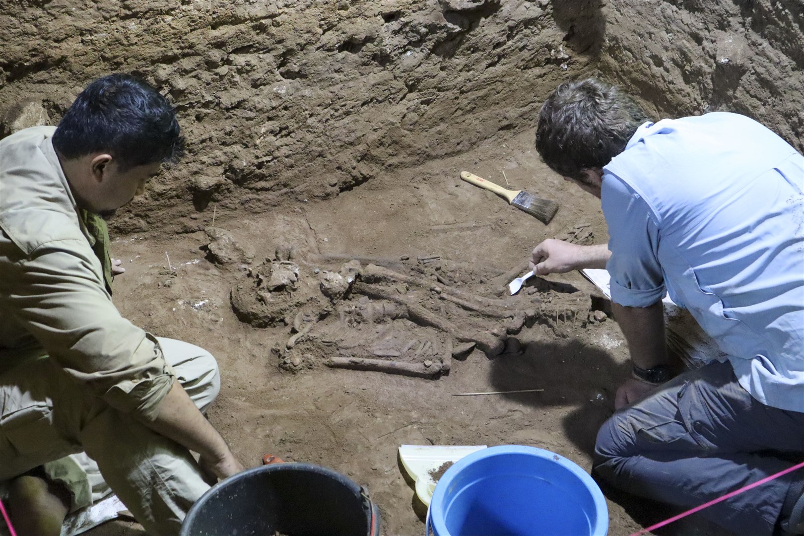 The remains have been dated to 31,000 years old (Tim Maloney/Griffith University/AP)