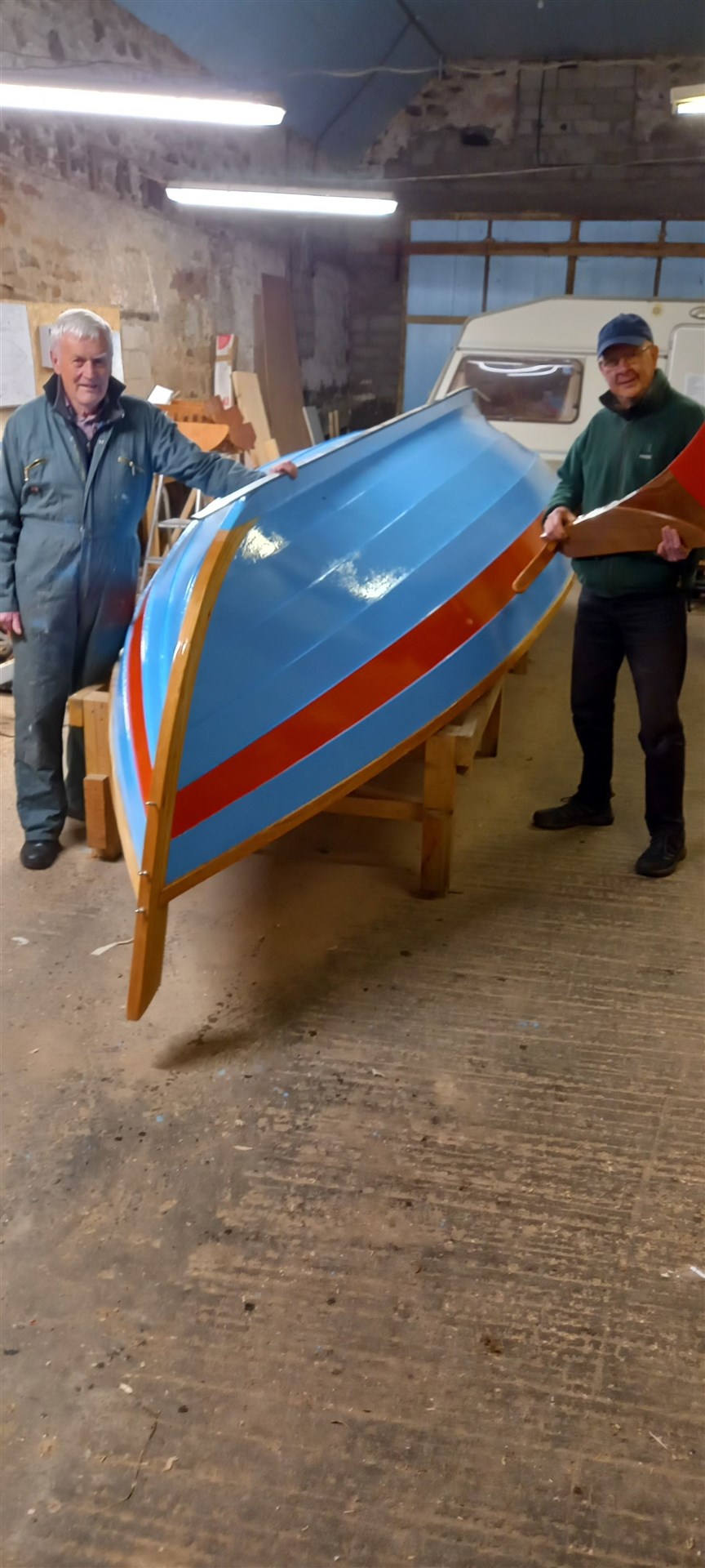 The new skiff nearing completion. Angus MacInnes (left) in charge of the build and Rob Raynor (right) one of the team of volunteer builders.