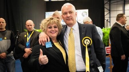 The SNP's Paul Monaghan, the newly elected MP for Caithness, Sutherland and Easter Ross celebrates with SNP Highland councillor Maxine Smith.