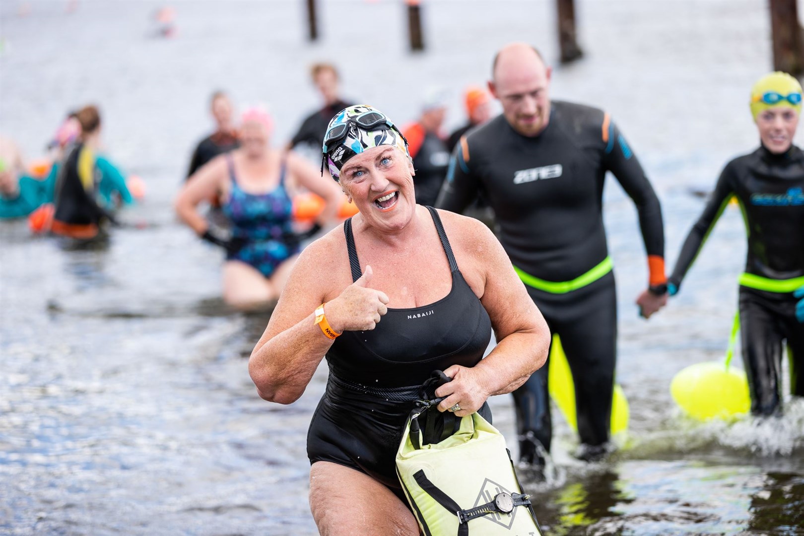Swimmers take to the chilly waters of Inverness for the Kessock Ferry Swim, returning after a 50 year gap. This classic route from South to North Kessock, and back again is approximately 1200m long and took place in exposed tidal water with an experienced safety support crew in support.