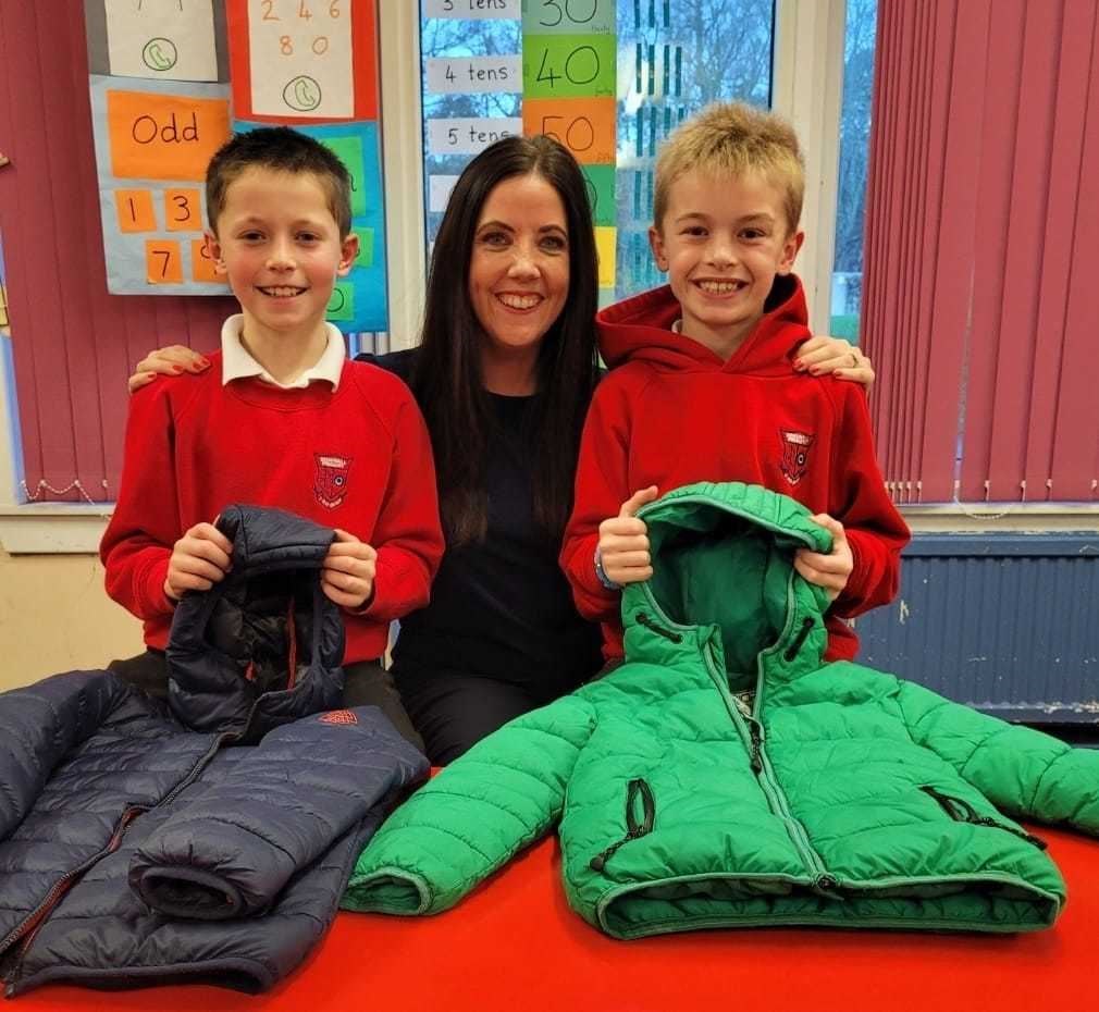 Teacher Eilidh Mellon with pupils ahead of the winter jacket appeal.