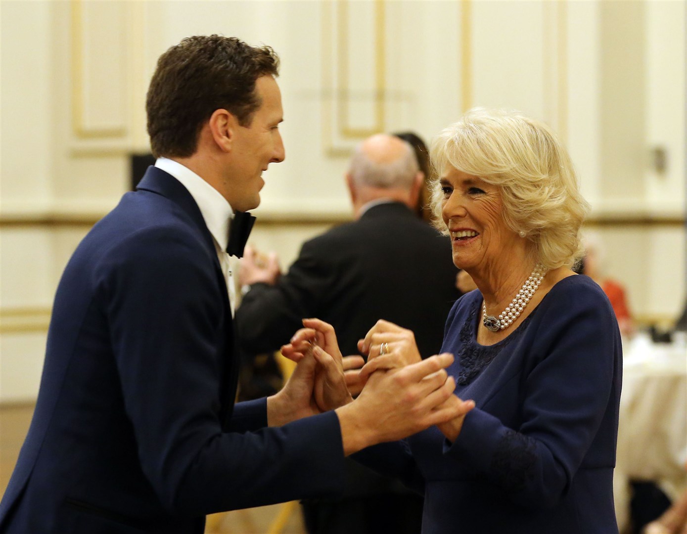 The Duchess of Cornwall dances with former Strictly Come Dancing professional Brendan Cole (Gareth Fuller/PA)