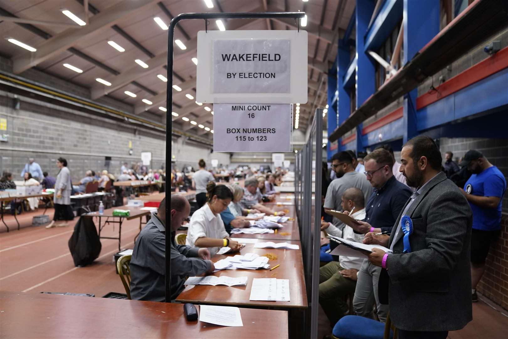 Party officials observe the count at Thornes Park Stadium in Wakefield (Danny Lawson/PA)