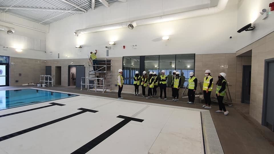 Pupils get a look at their new swimming pool.