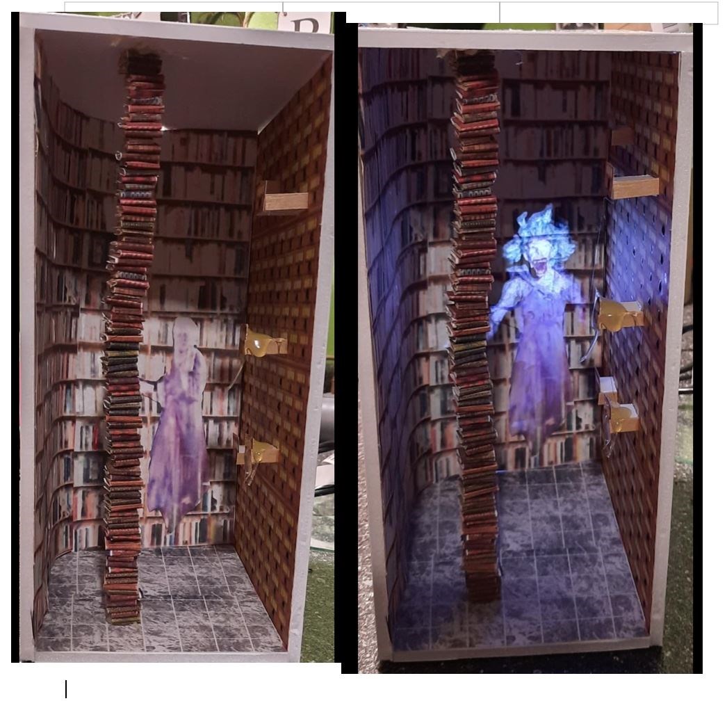 Ghostbusters book nook without and with a light on the figure (Janet Edgecomb Roller/PA)