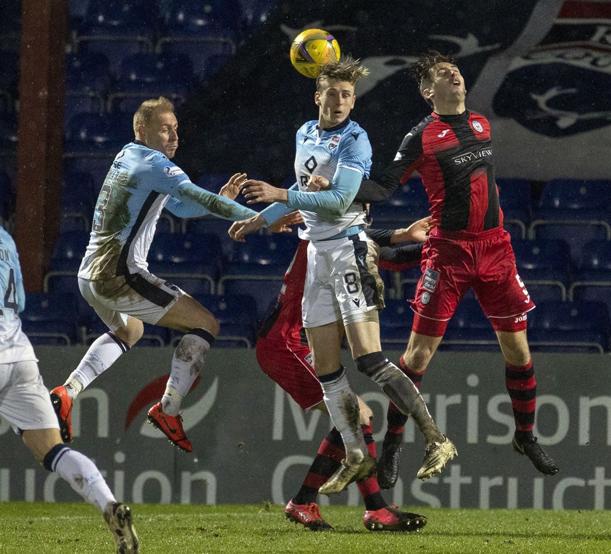 Picture - Ken Macpherson, Inverness. Ross County(0) v St.Mirren(2). 26.12.20. Ross County's Carl Tremarco and Oli Shaw combine to head clear from St.Mirren's Conor McCarthy.