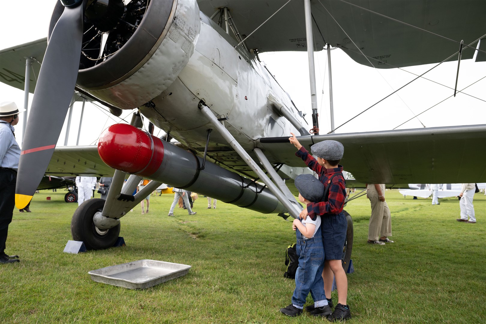 Young visitors inspect the Freddie March Spirit of Aviation display (John Nguyen/PA)