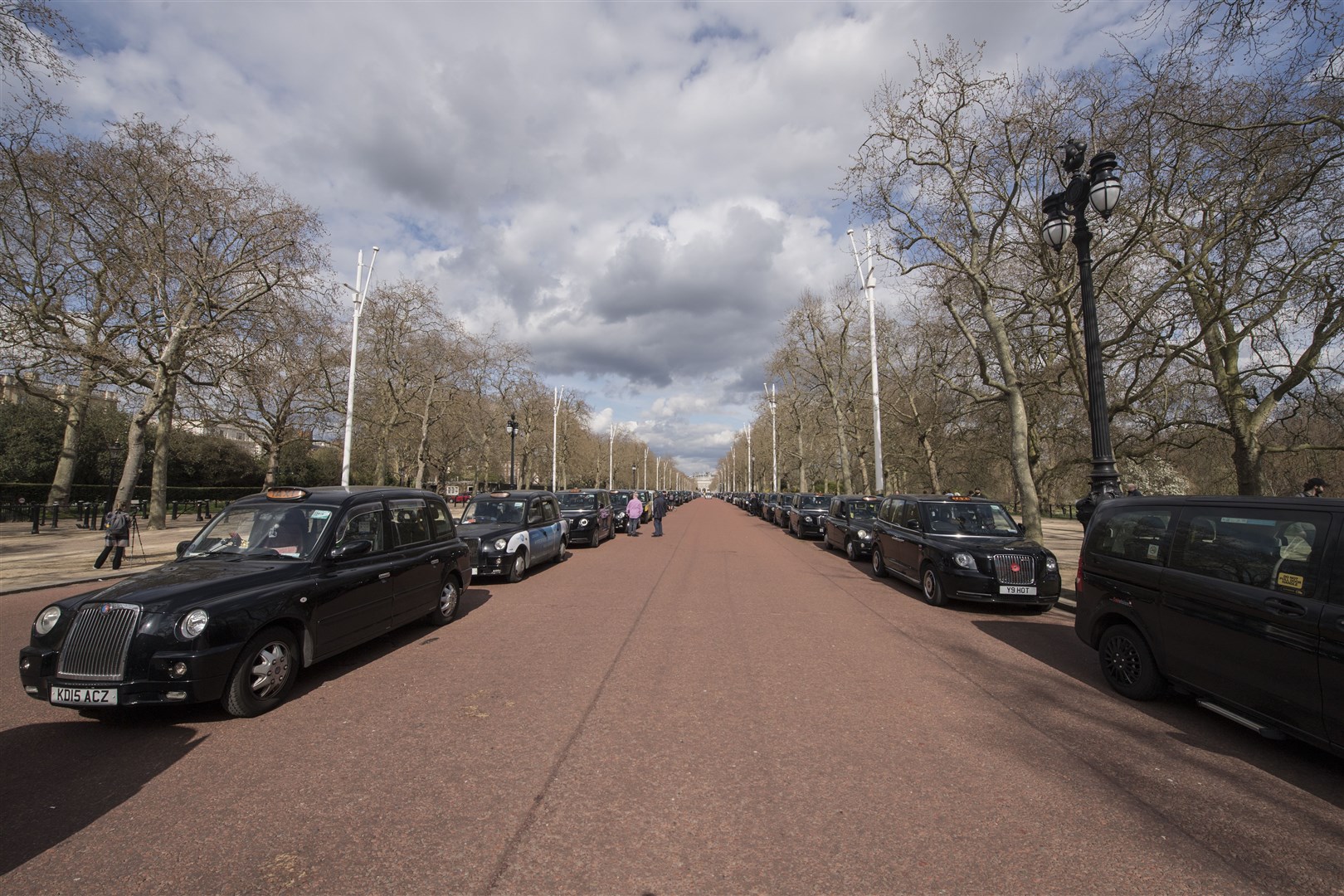 London black cabs line The Mall near Buckingham Palace (Ian West/PA)