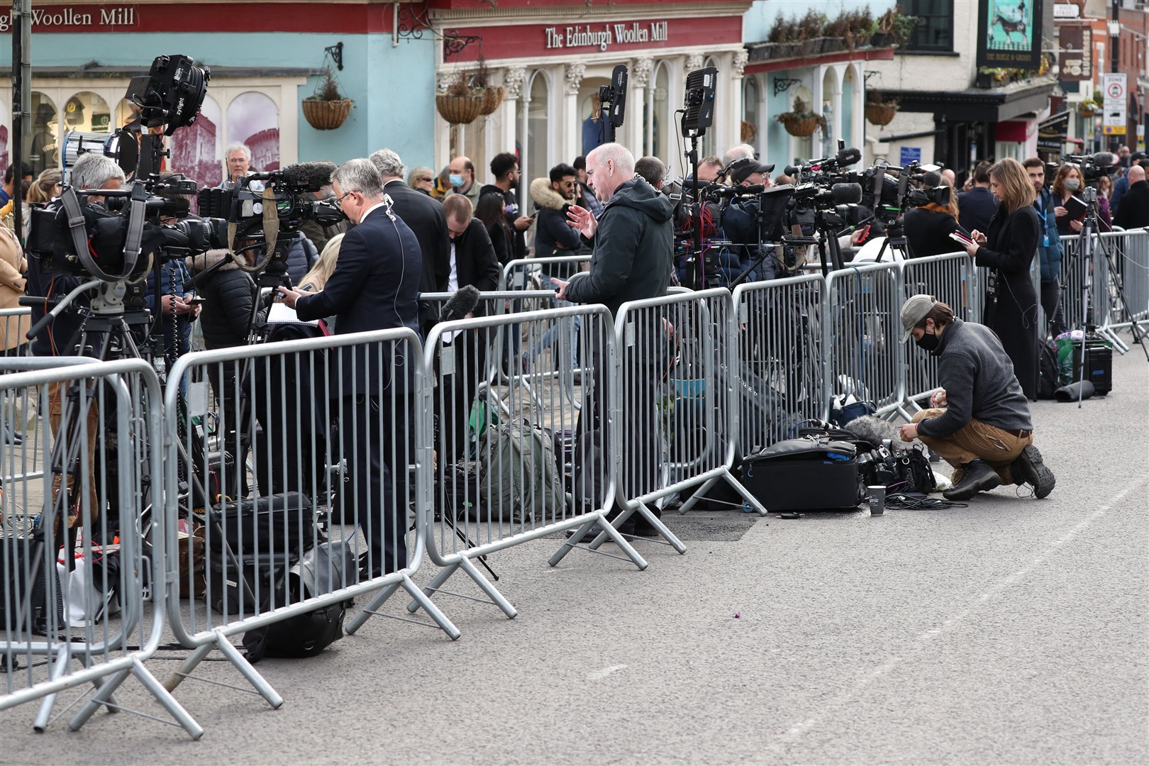 Members of the media gather outside Windsor Castle (Jonathan Brady/PA)