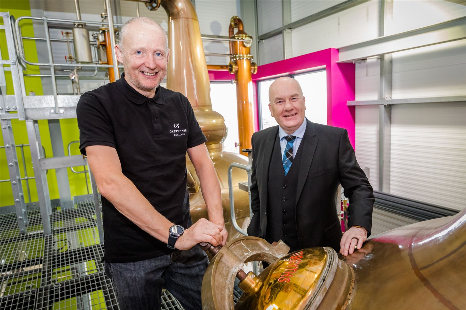 Duncan Tait distillery manager at Glenwyvis Distillery is pictured with David Taylor, HIE account manager.