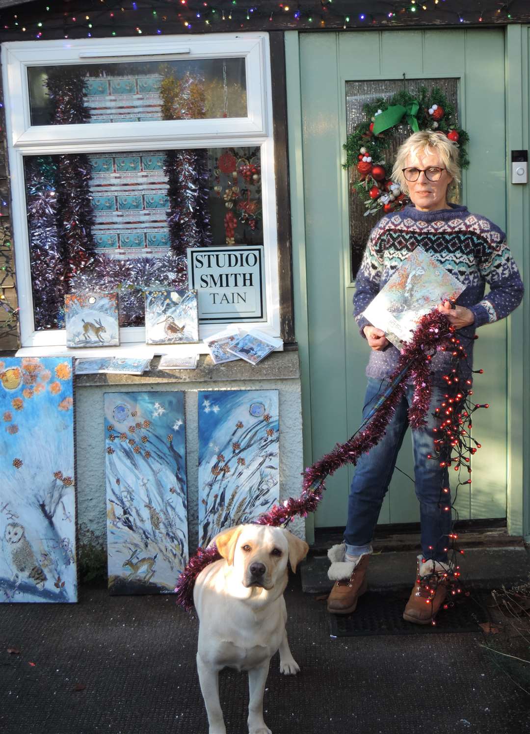 Ingebjorg Smith wearing a Scandi Jumper by Mum Inger Smith with Miss Myrtle, the Tinsel Tangler.