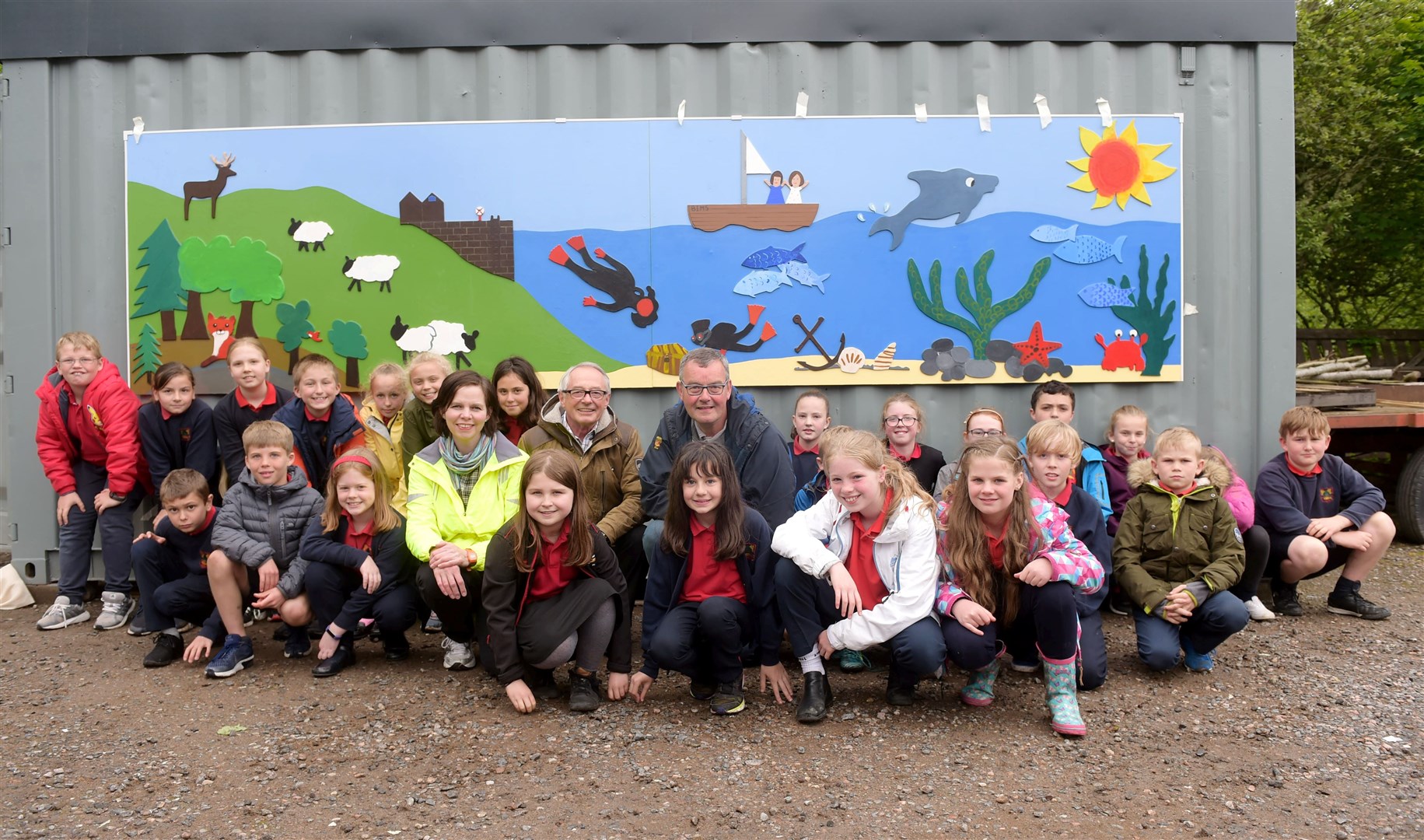 Avoch Primary kids pictured long before the Covid-19 crisis at the unveiling of the mural back in 2019. Picture: Callum Mackay
