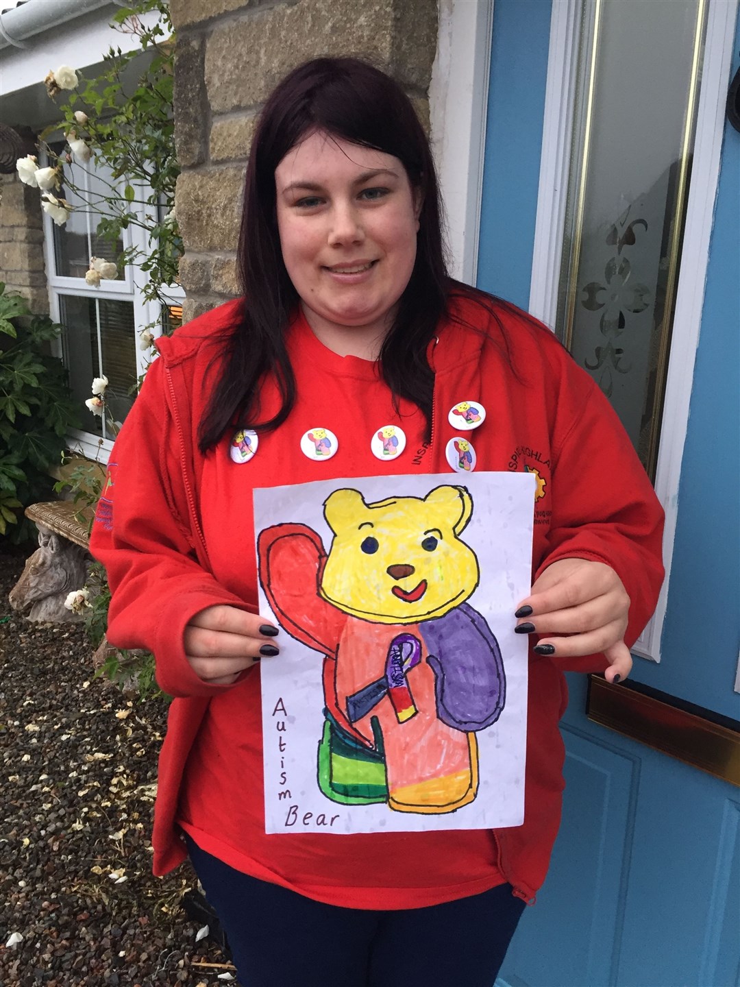 Hayley Reid and the colourful, eye-catching autism bear she hopes will spread awareness.