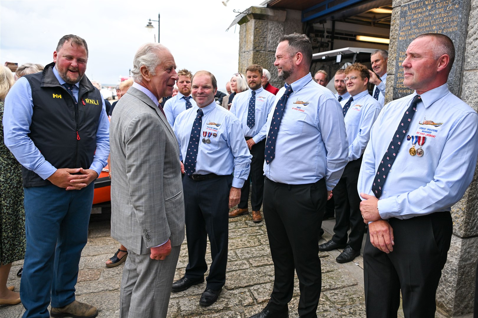 The King meets members of the St Ives RNLI (Finnbarr Webster/PA)