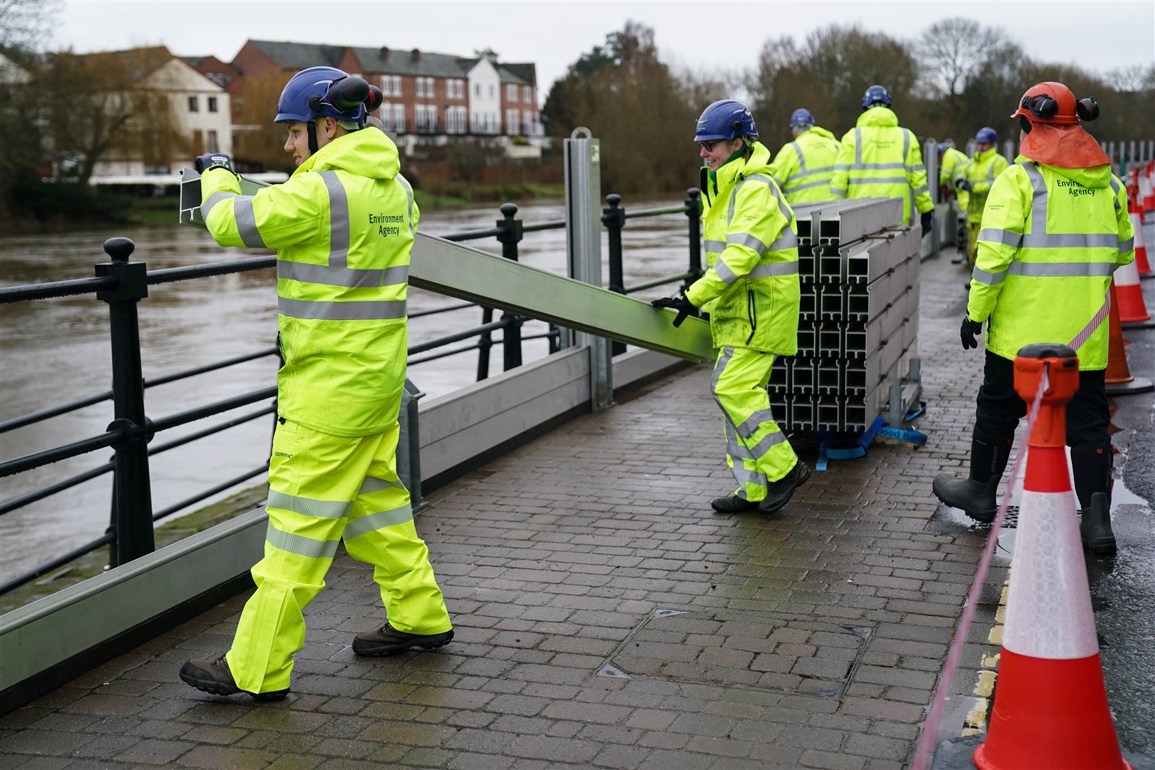 Workers from the Environment Agency installing flood defences in Bewdley, Worcestershire, on Tuesday (Jacob King/PA)
