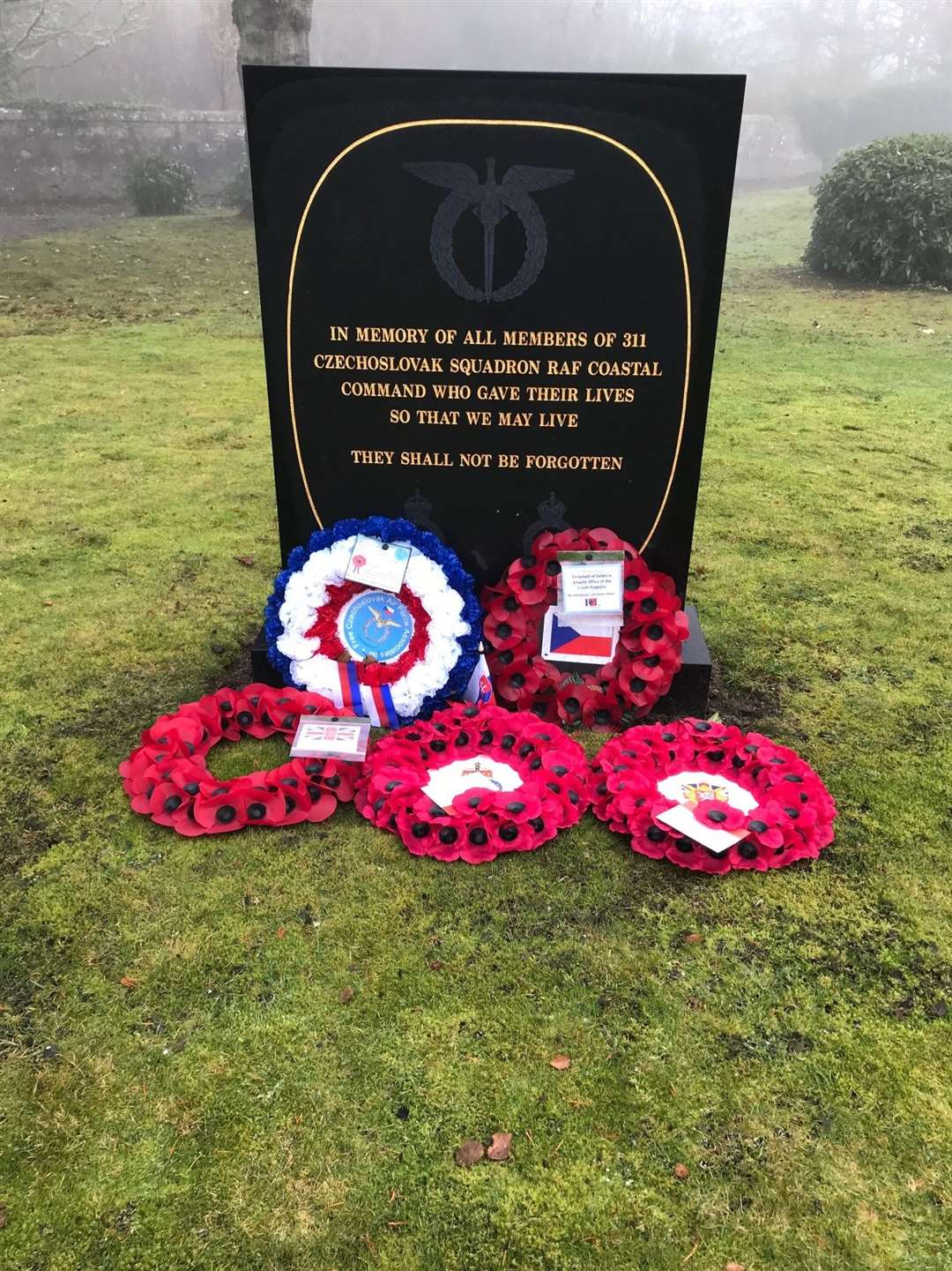 Wreaths to the Czech airmen at the Tain memorial.