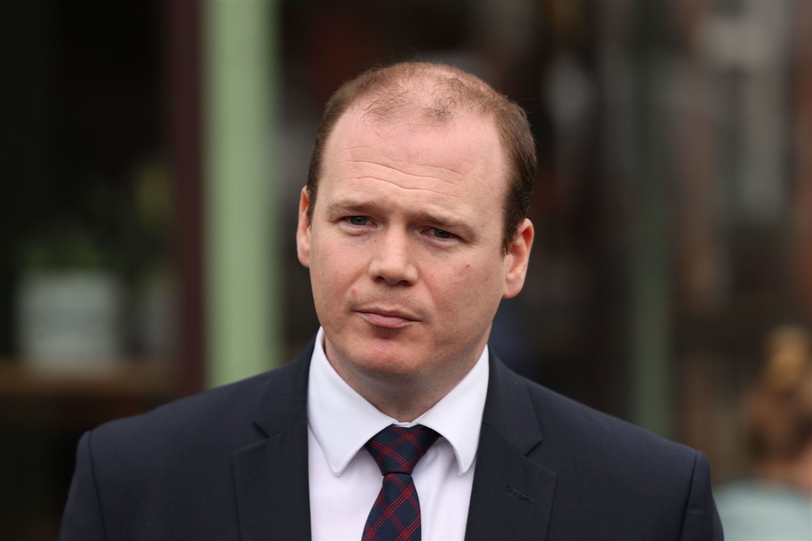 Economy Minister Gordon Lyons has criticised the Covid scheme (Liam McBurney/PA)