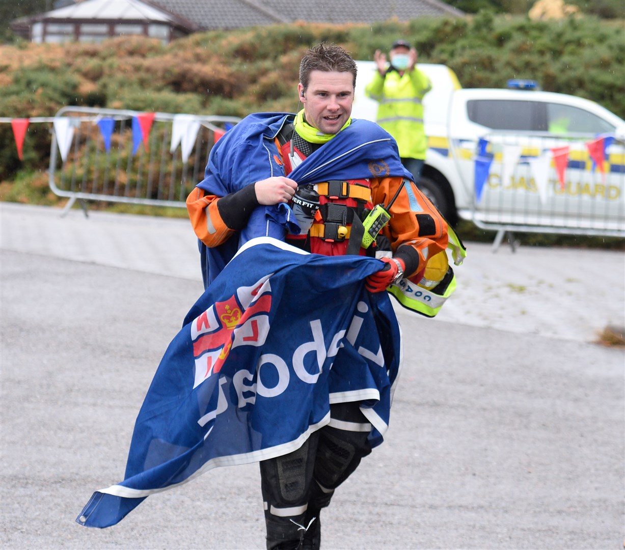 Rob Fielder completing a 620-mile challenge to raise money for the RNLI at North Kessock. Picture: Gary Anthony