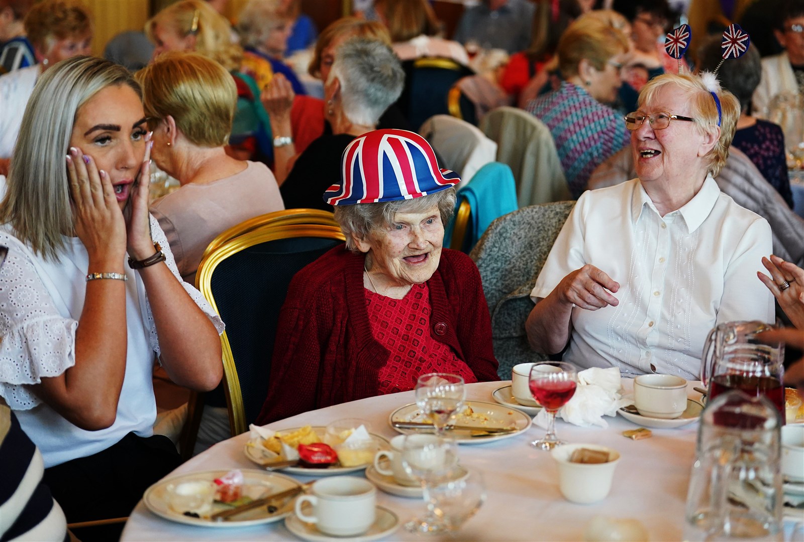 Fans young and old gathered to raise a cup of tea in toast to the Queen (Brian Lawless/PA)