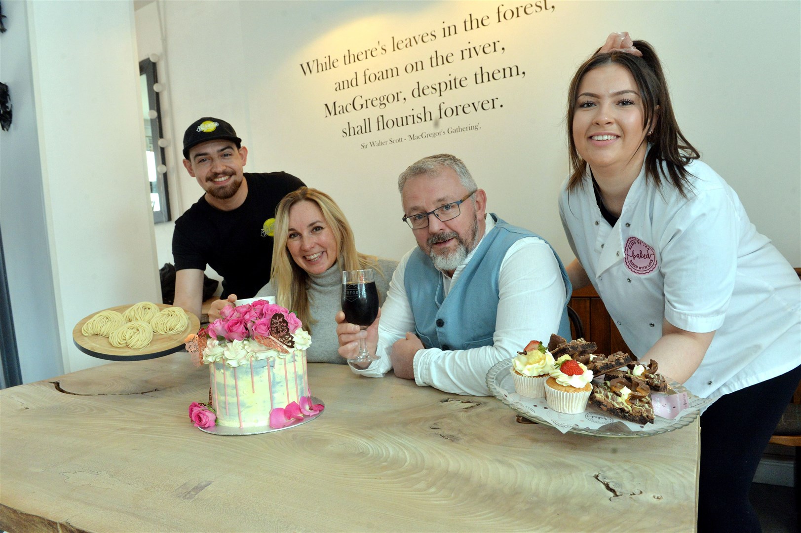Bruce MacGregor helps out two local businesses...Otello Calvert, Jo de Sylva, Bruce MacGregor and Jen Bowsher. Picture: Callum Mackay