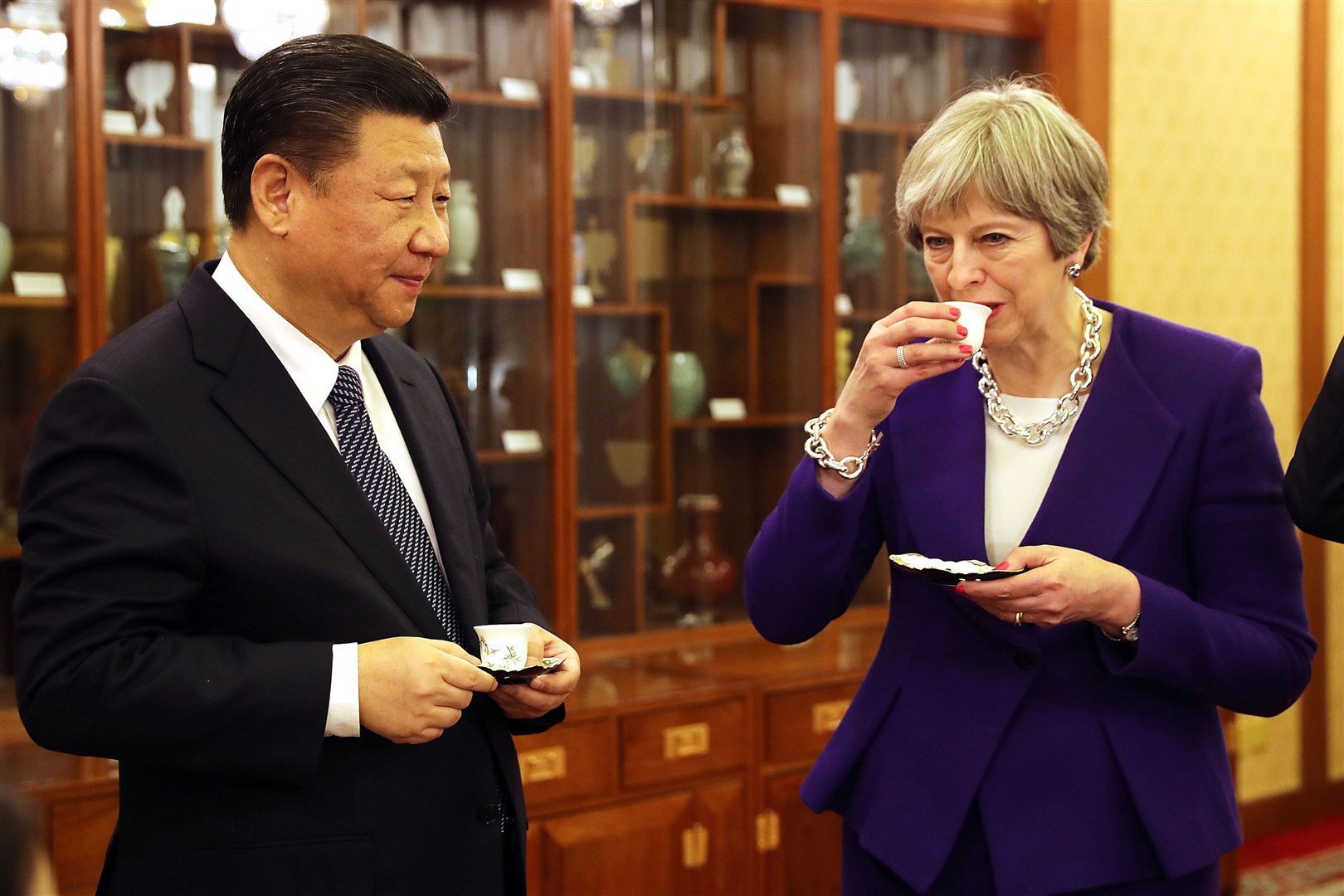 Former prime minister Theresa May with Chinese President Xi Jinping in Beijing in 2018 (PA)