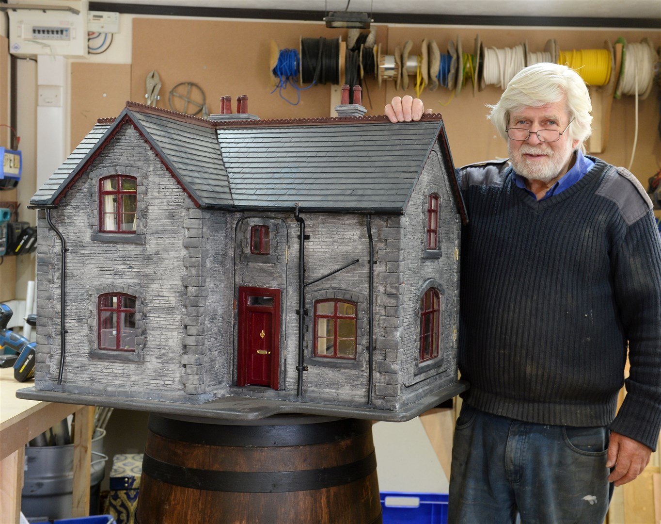 Mr Howker spent hundreds of hours creating the doll's house during lockdown. Picture: Gary Anthony