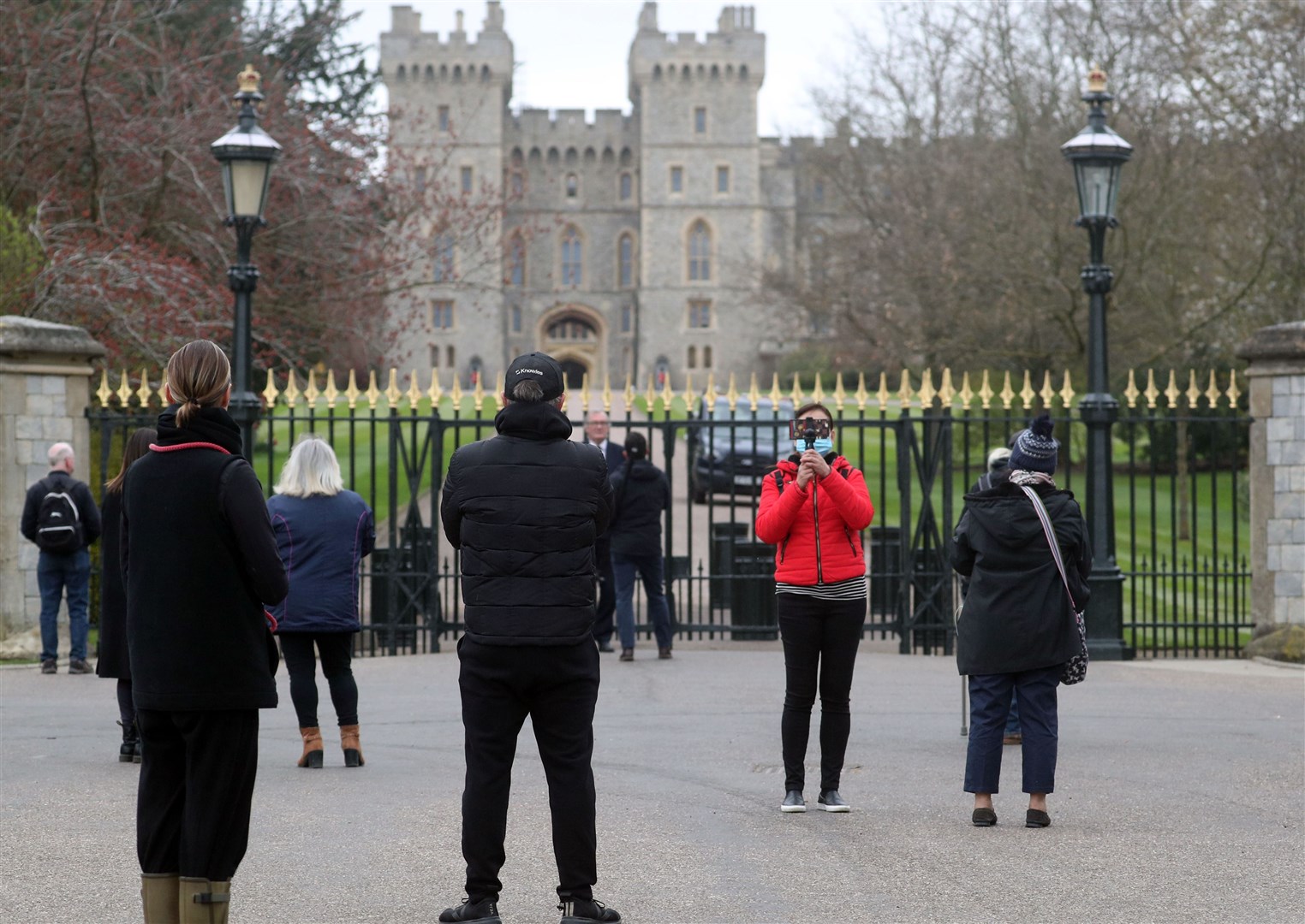 People gathered outside Windsor Castle on Saturday (Steve Parsons/PA)
