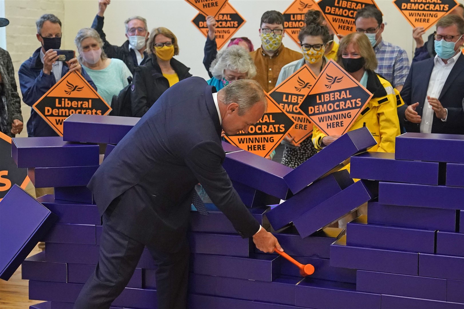 Sir Ed Davey celebrates the Lib Dems success knocking down the ‘blue wall’ in the Chesham and Amersham by-election (Steve Parsons/PA)