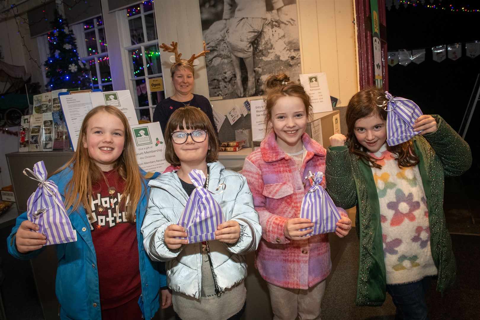 Maisie Purcifer, Laila Maclennan, Abby Butler and Lola MacGillivray with the goodies after completing the treasure hunt. Picture: Callum Mackay
