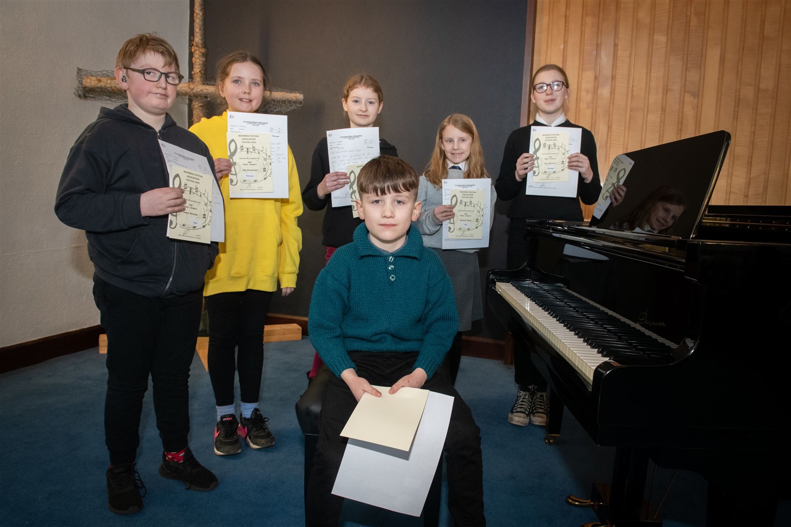Grade 2 Piano: Innes Bennie, Isla Swanson, Iona Bradley, Chrissie Ross, Ava Skinner and winner Roan James (seated). Picture: Callum Mackay