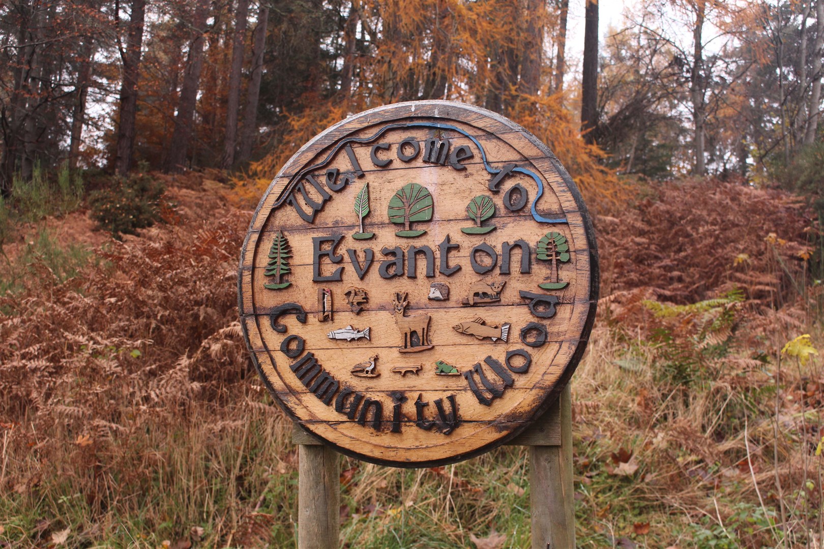 A sign welcomes people to Evanton Community Woods.