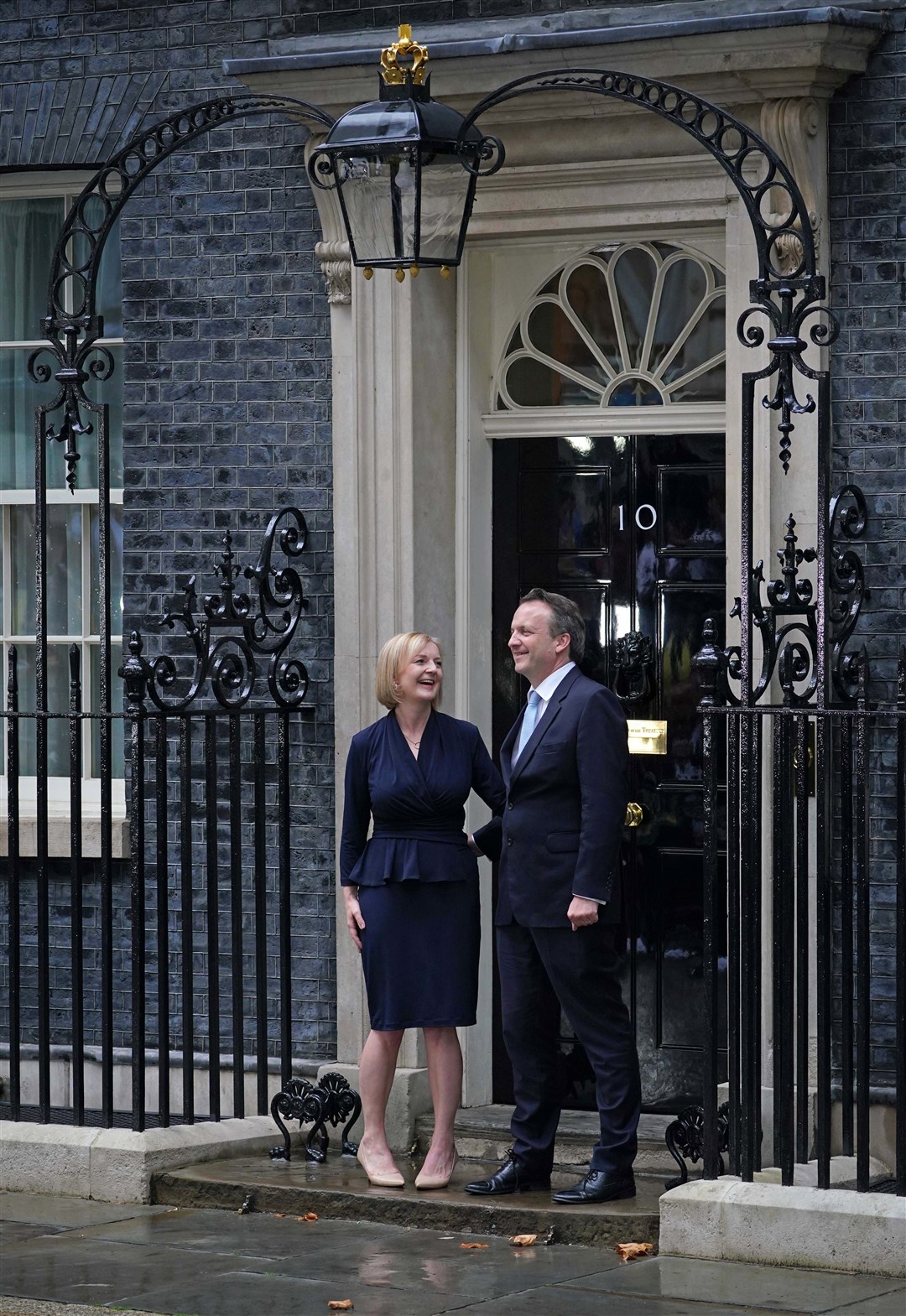 Prime Minister Liz Truss and her husband Hugh O’Leary outside 10 Downing Street (Yui Mok/PA)
