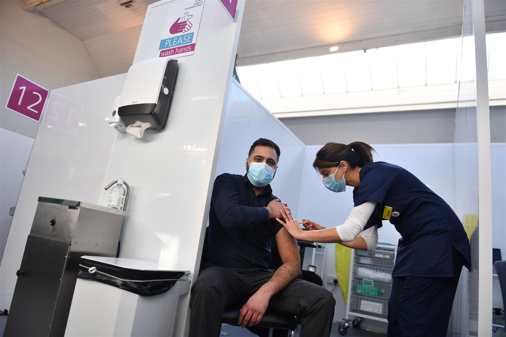 Pharmacist Josh Athwal receives a vaccination at the museum. (Jacob King/PA)